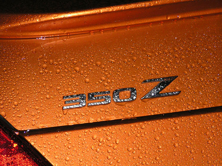 close detail badge orange bronze
